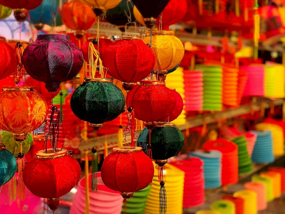 Buying colorful lanterns on Mid Autumn festival is a typical Chinese cultural distinct